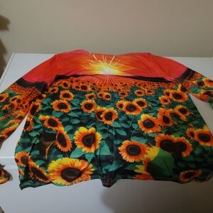 2 xl long sleeve shirt with flowers and a sunrise on it